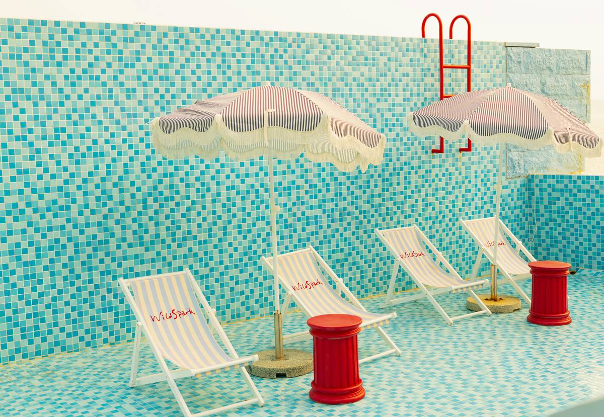 Close-up of secure collar mechanism on premium poolside umbrellas with stand